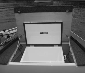 The large rear opening hatch on the leading edge of the front casting platform holds an 85L Eva Kool esky. Support struts allow two handed access to the ice box.